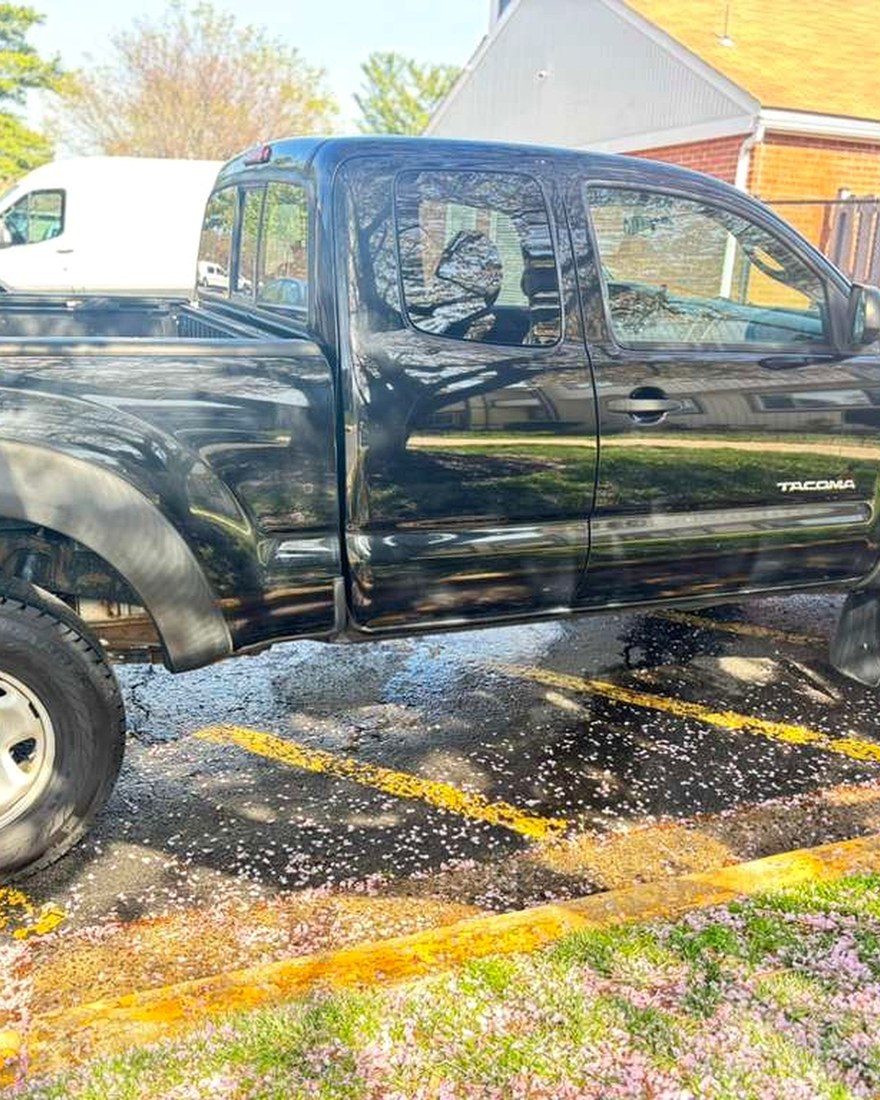 Wet Toyota Tacoma during a mobile exterior wash